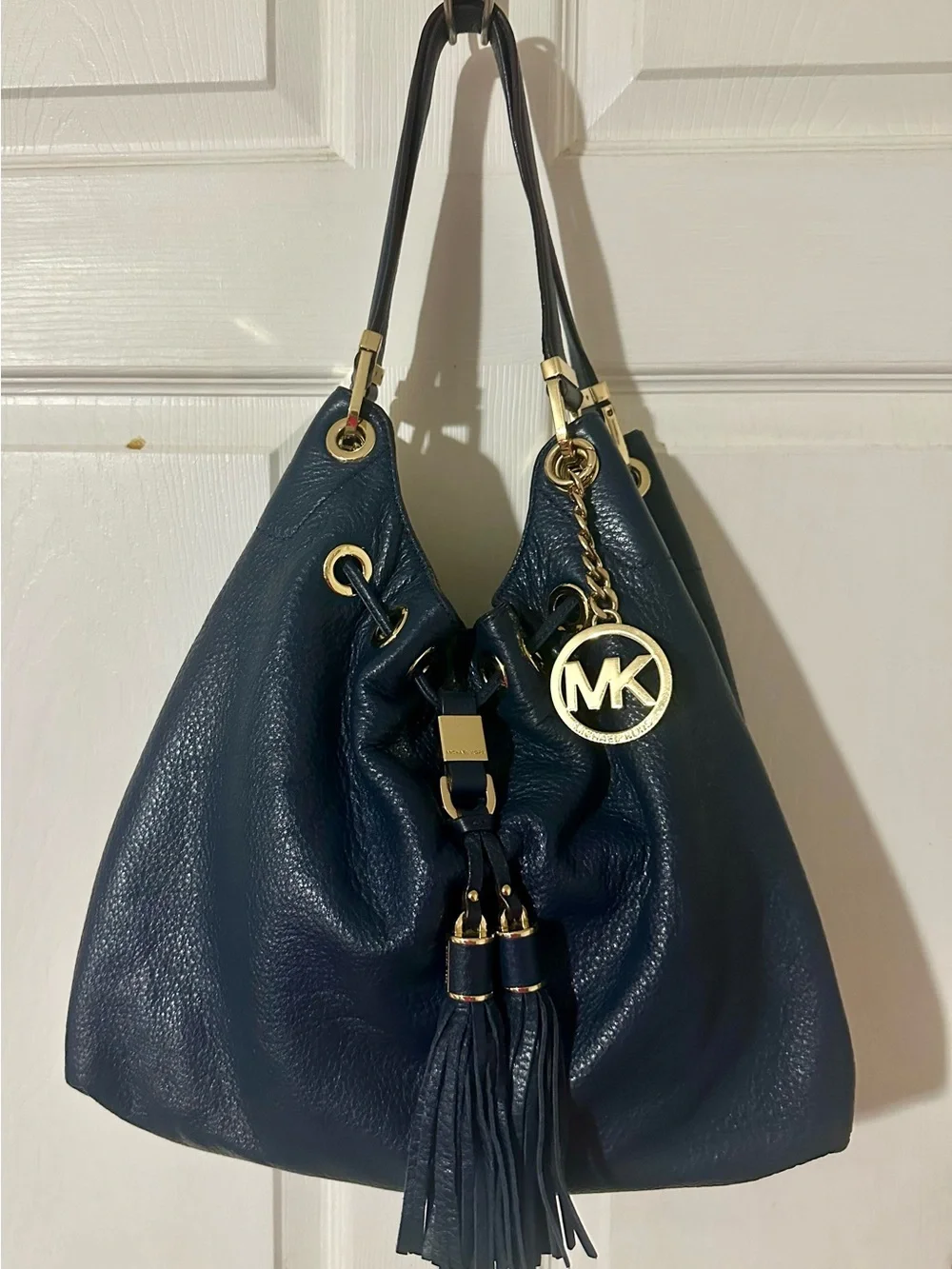 Michael Kors Navy Pebbled Leather Tassel Hobo with Gold Hardware
